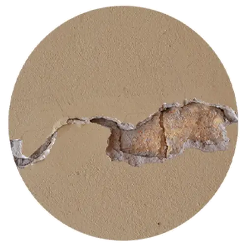 Cracks in rendered wall