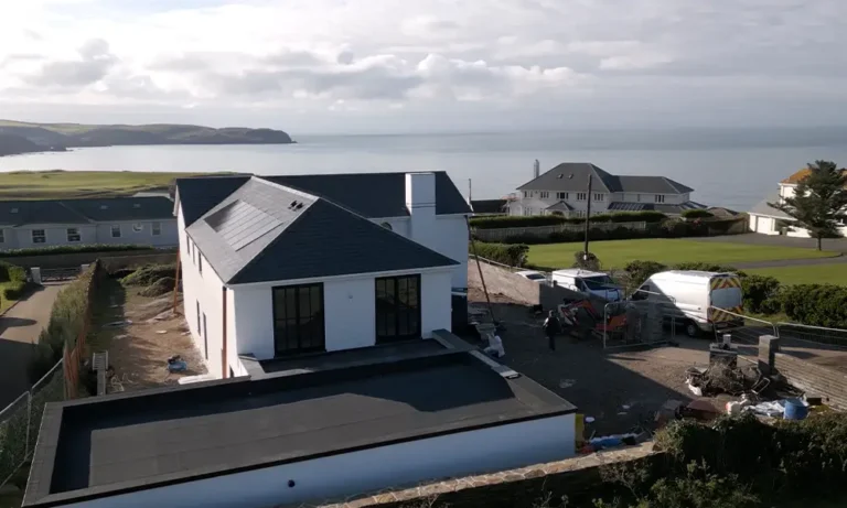 modern house with full silicone render near seafront with sea views